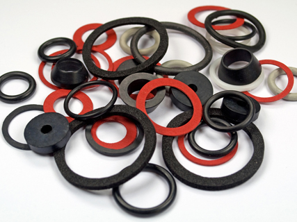 stack of custom o-rings and standard AS568 orings that mykin has manufactured