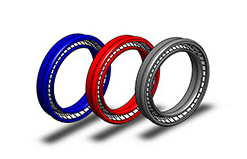 ptfe spring seals in red blue and grey that mykin manufactures